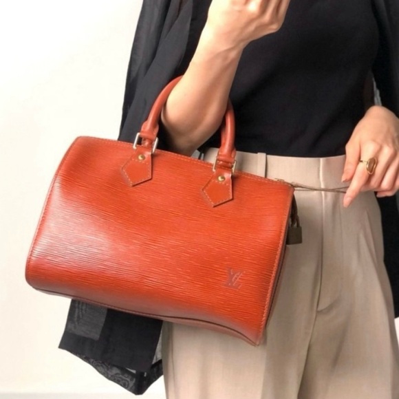 Louis Vuitton Speedy 35 Epi Cognac Brown Leather Bag
- Authentic. P0031 - Picture 1 of 13